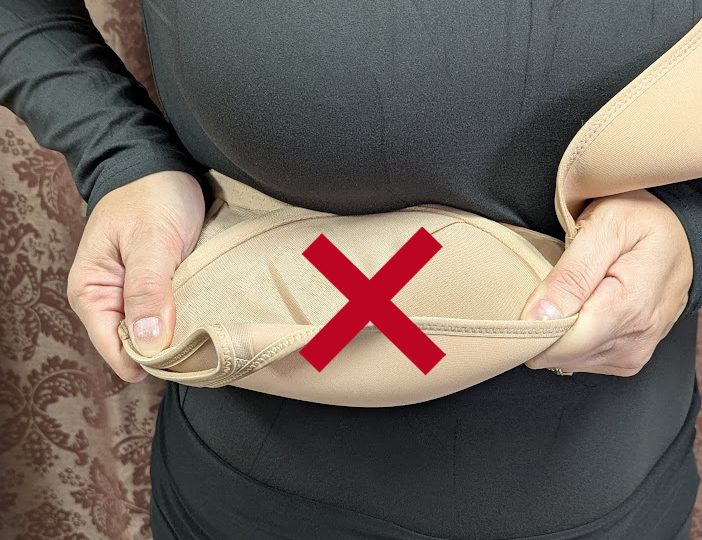 Why "cups down" causes bra damage